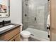 Modern bathroom showcasing a walk-in shower with stylish tile work and a sleek vanity with contemporary fixtures at 200 Simonton Rd, Lawrenceville, GA 30046