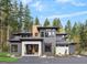 Modern home featuring clean lines, large windows, and professional landscaping for an amazing curb appeal at 200 Simonton Rd, Lawrenceville, GA 30046
