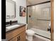 Modern bathroom featuring a glass-enclosed shower, sleek vanity with black accents and stylish fixtures at 200 Simonton Rd, Lawrenceville, GA 30046