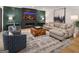 Comfortable living room featuring a fireplace, TV, modern decor, and stylish seating area at 200 Simonton Rd, Lawrenceville, GA 30046