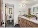 Contemporary bathroom with double vanity, stone countertops, and patterned tile floor at 200 Simonton Rd, Lawrenceville, GA 30046