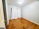 Bright bedroom with hardwood floors and ample natural light at 485 Evergreen Dr, Forest Park, GA 30297