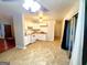Kitchen with white cabinets and tile floors at 485 Evergreen Dr, Forest Park, GA 30297