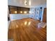 Living room with hardwood floors and built-in shelving at 485 Evergreen Dr, Forest Park, GA 30297