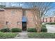 Brick building exterior with a blue awning and entryway at 2251 Pernoshal Ct, Atlanta, GA 30338