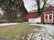 The backyard is largely green grass, with a building in the back at 6148 Park Dr, Forest Park, GA 30297