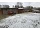 Large backyard with light snow cover at 6148 Park Dr, Forest Park, GA 30297