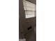Tiled bathroom featuring a standard toilet, towel rack and window at 6148 Park Dr, Forest Park, GA 30297