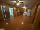 Kitchen featuring wood cabinetry and laminate countertops at 6148 Park Dr, Forest Park, GA 30297