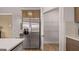 Modern kitchen with stainless steel refrigerator and walk-in pantry at 753 Myrica Ave, Locust Grove, GA 30248