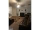 Living room featuring a fireplace and comfortable seating at 2658 Deann Dr, Ellenwood, GA 30294