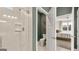 Bathroom with shower and toilet, access to bedroom at 749 Myrica Ave # 208, Locust Grove, GA 30248