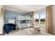 Charming bedroom with a bunk bed and plenty of natural light at 749 Myrica Ave # 208, Locust Grove, GA 30248
