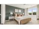 Spacious bedroom with a calm color scheme and large window at 749 Myrica Ave # 208, Locust Grove, GA 30248