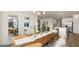 Elegant dining room with a long wooden table, perfect for gatherings at 749 Myrica Ave # 208, Locust Grove, GA 30248