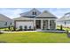 House exterior with brick and siding, landscaping at 749 Myrica Ave # 208, Locust Grove, GA 30248