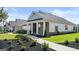 Home exterior with brick and siding, walkway at 749 Myrica Ave # 208, Locust Grove, GA 30248
