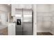 Modern kitchen showcasing stainless steel appliances and ample pantry space at 749 Myrica Ave # 208, Locust Grove, GA 30248