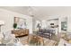 Open concept kitchen and living room with island and modern appliances at 749 Myrica Ave # 208, Locust Grove, GA 30248