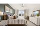 Main bedroom with plush bed and lots of natural light at 749 Myrica Ave # 208, Locust Grove, GA 30248