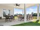 Covered patio with seating area, perfect for outdoor entertaining at 749 Myrica Ave # 208, Locust Grove, GA 30248
