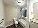 Updated bathroom with granite vanity and bathtub at 3880 Springleaf Ct, Stone Mountain, GA 30083