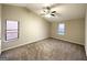 Spacious bedroom with carpeted floors and ceiling fan at 3880 Springleaf Ct, Stone Mountain, GA 30083
