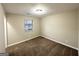 Spacious bedroom with neutral walls and carpet flooring at 3880 Springleaf Ct, Stone Mountain, GA 30083