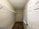 Walk-in closet with wire shelving and neutral walls at 3880 Springleaf Ct, Stone Mountain, GA 30083