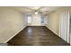 Large living room with hardwood floors and ceiling fan at 3880 Springleaf Ct, Stone Mountain, GA 30083