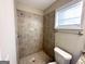 Clean bathroom with shower stall, toilet and granite vanity at 2270 Mark Trl, Decatur, GA 30032