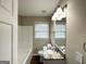 Updated bathroom with granite vanity and a bathtub at 2270 Mark Trl, Decatur, GA 30032