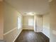 Cozy dining area with hardwood floors and neutral paint at 2270 Mark Trl, Decatur, GA 30032