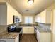 Modern kitchen with white cabinets and granite countertops at 2270 Mark Trl, Decatur, GA 30032