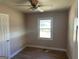 Bedroom with hardwood floors and a ceiling fan at 285 Queen Helen Ln, Jonesboro, GA 30236