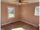 Bedroom with hardwood floors and a ceiling fan at 285 Queen Helen Ln, Jonesboro, GA 30236