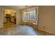 Dining area with a view and access to the kitchen at 155 Island Shoals Rd, Covington, GA 30016