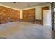 Brick garage with concrete floor and two entry doors at 155 Island Shoals Rd, Covington, GA 30016