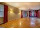 Spacious living room featuring hardwood floors and a built-in hot tub at 155 Island Shoals Rd, Covington, GA 30016
