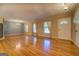 Spacious living area with hardwood floors and ample natural light at 155 Island Shoals Rd, Covington, GA 30016