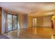 Living area with hardwood floors and access to patio at 155 Island Shoals Rd, Covington, GA 30016