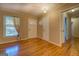 Hardwood floors and neutral walls create a bright and airy living space at 155 Island Shoals Rd, Covington, GA 30016
