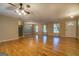 Hardwood floors and large windows brighten this open living room at 155 Island Shoals Rd, Covington, GA 30016
