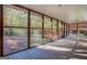 Spacious screened porch overlooking the backyard at 155 Island Shoals Rd, Covington, GA 30016