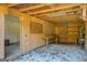 Interior view of workshop, showing wooden walls and workbenches at 155 Island Shoals Rd, Covington, GA 30016