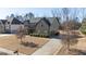 Two-story house with a large backyard and driveway at 160 Traditions Ln, Hampton, GA 30228