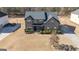 Two-story house, landscaped yard, and driveway at 160 Traditions Ln, Hampton, GA 30228