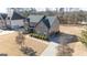 Two-story house with a large backyard and driveway at 160 Traditions Ln, Hampton, GA 30228