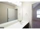 Bathroom boasts a vanity with a mirror and a toilet at 160 Traditions Ln, Hampton, GA 30228
