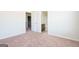 Bedroom with an ensuite bathroom and access to hallway at 160 Traditions Ln, Hampton, GA 30228